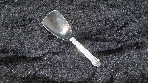 # Inheritance Silver Nr. 6 Sugar spatula
Length 12 cm.
Hans Hansen silver cutlery