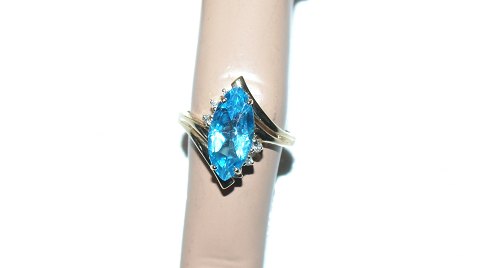 14 Carat gold ring with Topaz and Diamonds