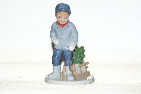 Royal Copenhagen Figurine, Peter (Boy with Christmas tree on the toboggan) 2005