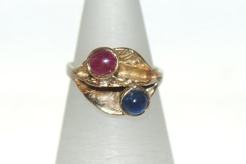 Gold ring with red and blue stones 14 Karat