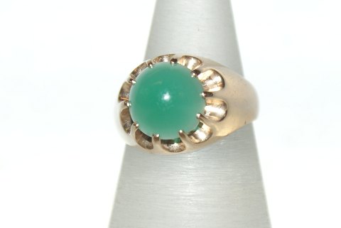 Gold ring with green stone