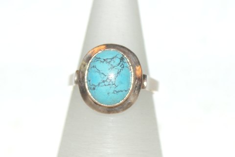 Gold ring with blue stones