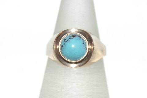 Gold ring with blue stones