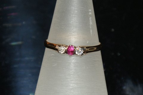 Gold ring with Diamonds and red stone 14 Karat
