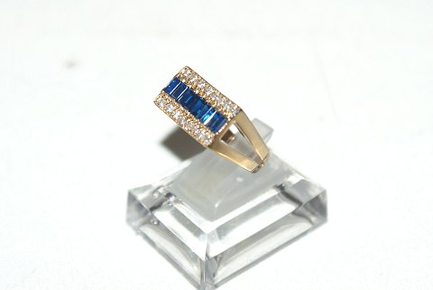 Gold ring with blue sapphire and white zones stone 14 carat gold