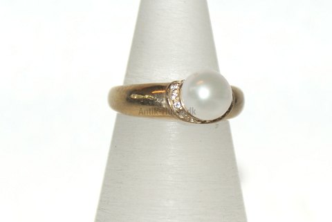 8 carat gold ring with pearl
Size 53