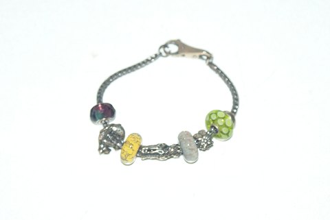 Elegant Silver Bracelet with Charms
SOLD