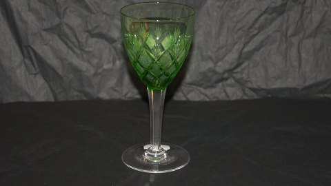 White wine glass Green # Antique glass from Holmegaard Glasværk.
SOLD