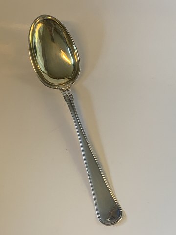 Silver serving spoon #Double fluted silver
with gilded laf