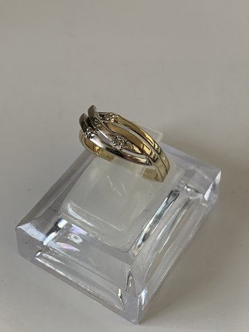 Beautiful and unique gold ring with Brilliant
and 14 carat gold and white gold