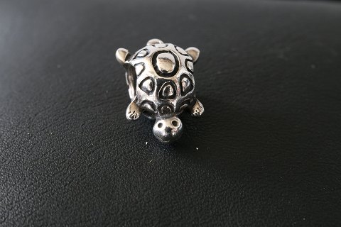 Charm for bracelets, from Pandora designed as a turtle. 925 sterling silver.