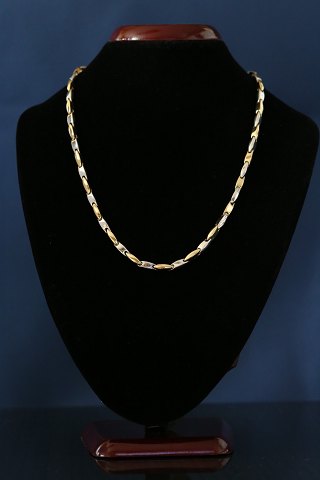 Gold chain in red and white gold, 14 carat solid gold. With carabiner lock.