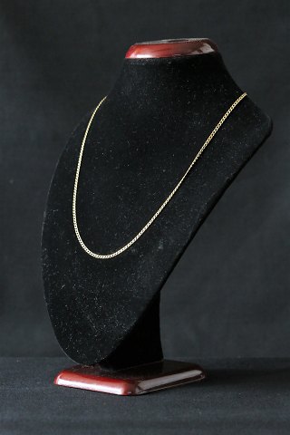 Necklace in 14 carat gold, armor similar design, and with carabiner clasp.