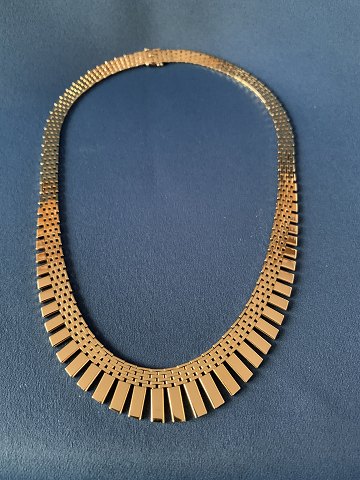 Necklace in 14 carat gold, bricks in 7 rows, with process, stamped 585 JTH. 
Length 41 cm.
