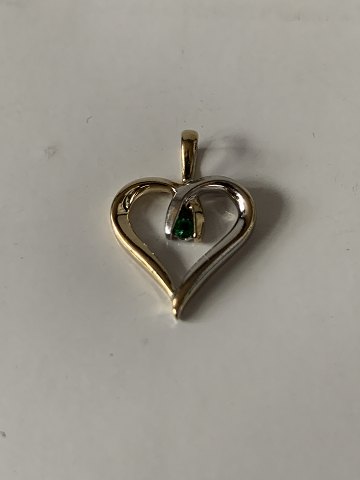 Pendant for necklace in 14 carat red-white gold, with an emerald inlaid.