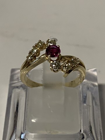 Gold ring in 14 carat gold, with red ruby &#8203;&#8203;and diamonds. Size 51.