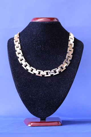 Block gold chain in 14 karat gold, stamped Hv & Sk 585.