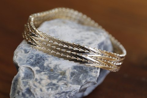 Geneva gold bracelet with 2 rows, in 14 karat gold.
Length: 18.5 cm.