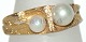 Gold ring with pearls, 14 carat
Size: 54