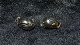Øreringe med clips i sølv
Stemplet 925 s
Måler 14,51*10,22 mm