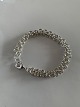 Sterling silver bracelet, 19.5 centimeters long, with heart clasp.