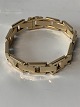 Block gold bracelet, with 3 rows in 14 carat gold, stamped SEJ 585, with box 
clasp.