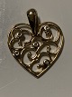 Pendant 14 carat gold, designed as a Heart
with embedded diamonds.