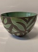 Ceramic glazed bowl, in green and brown colours.