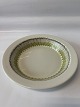 Royal Copenhagen Trina Dyb tallerken i fajance 
Diameter 18,5 cm